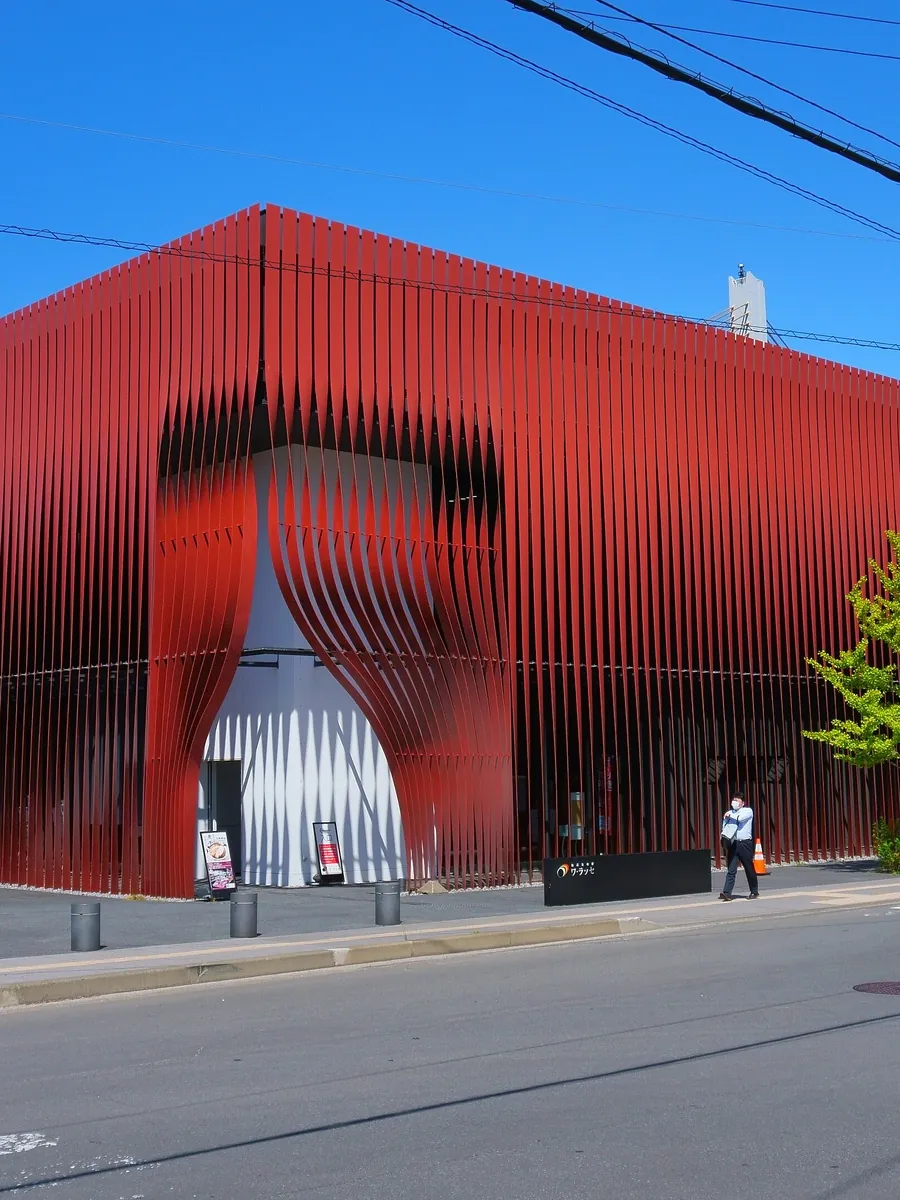 The red facade of Nebuta Museum Wa Rasse, Aomori