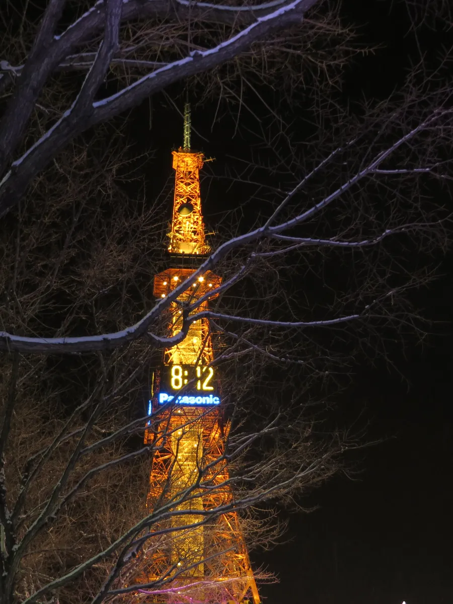 Sapporo TV Tower lit up on a winter night