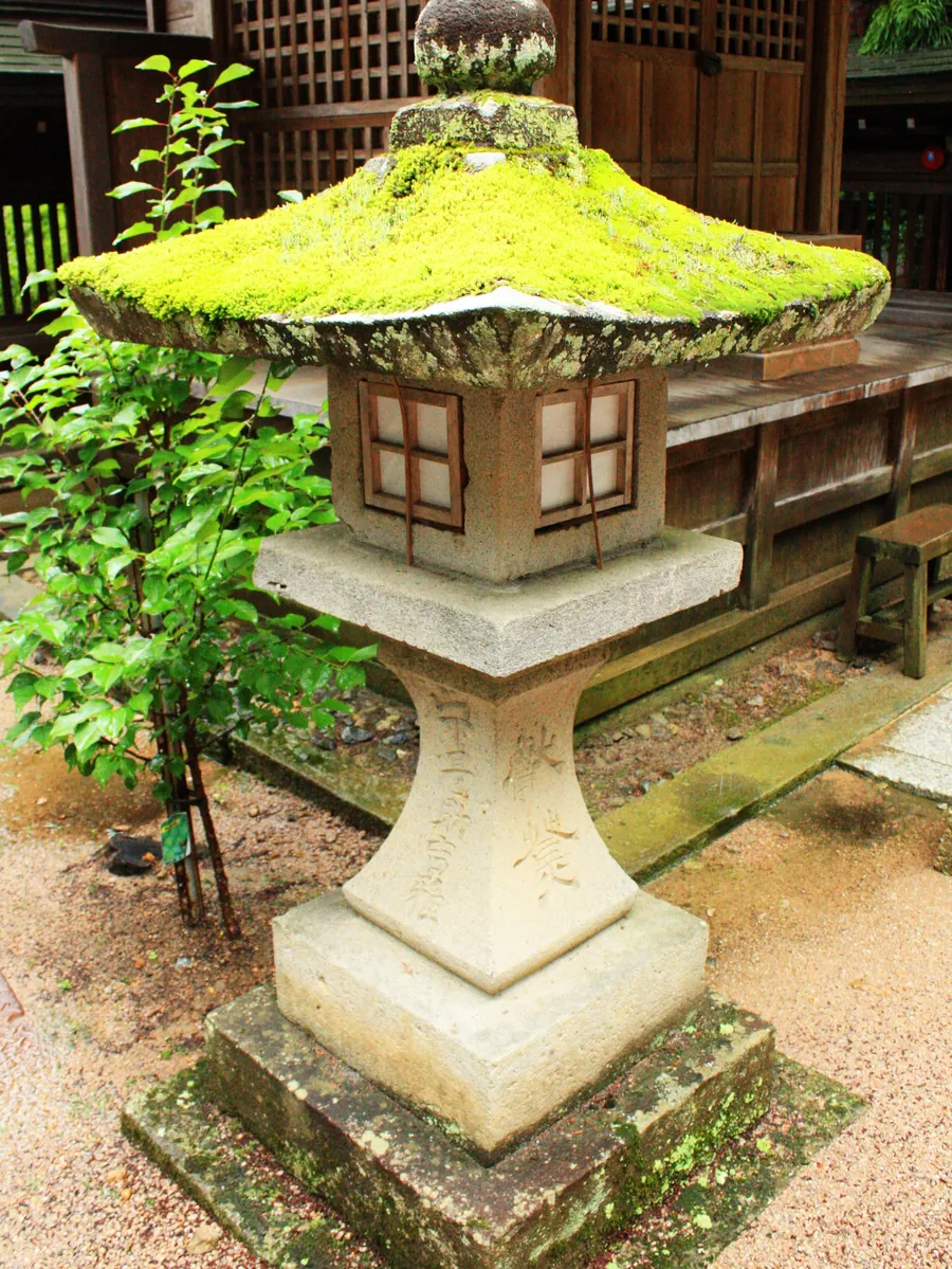 A moss-topped stone lantern at Sakurayama Hachimangu Shrine, Takayama