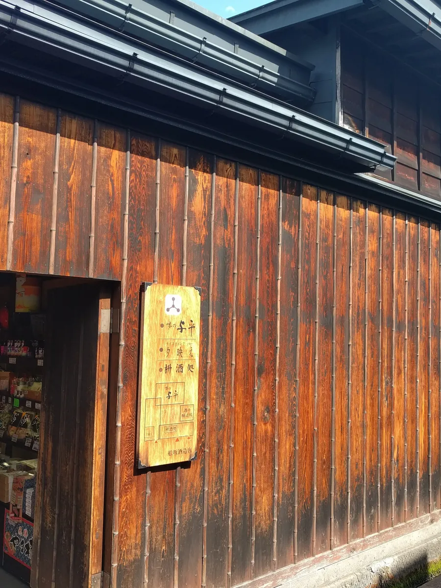 Dark timber walls of an old merchant house in Takayama